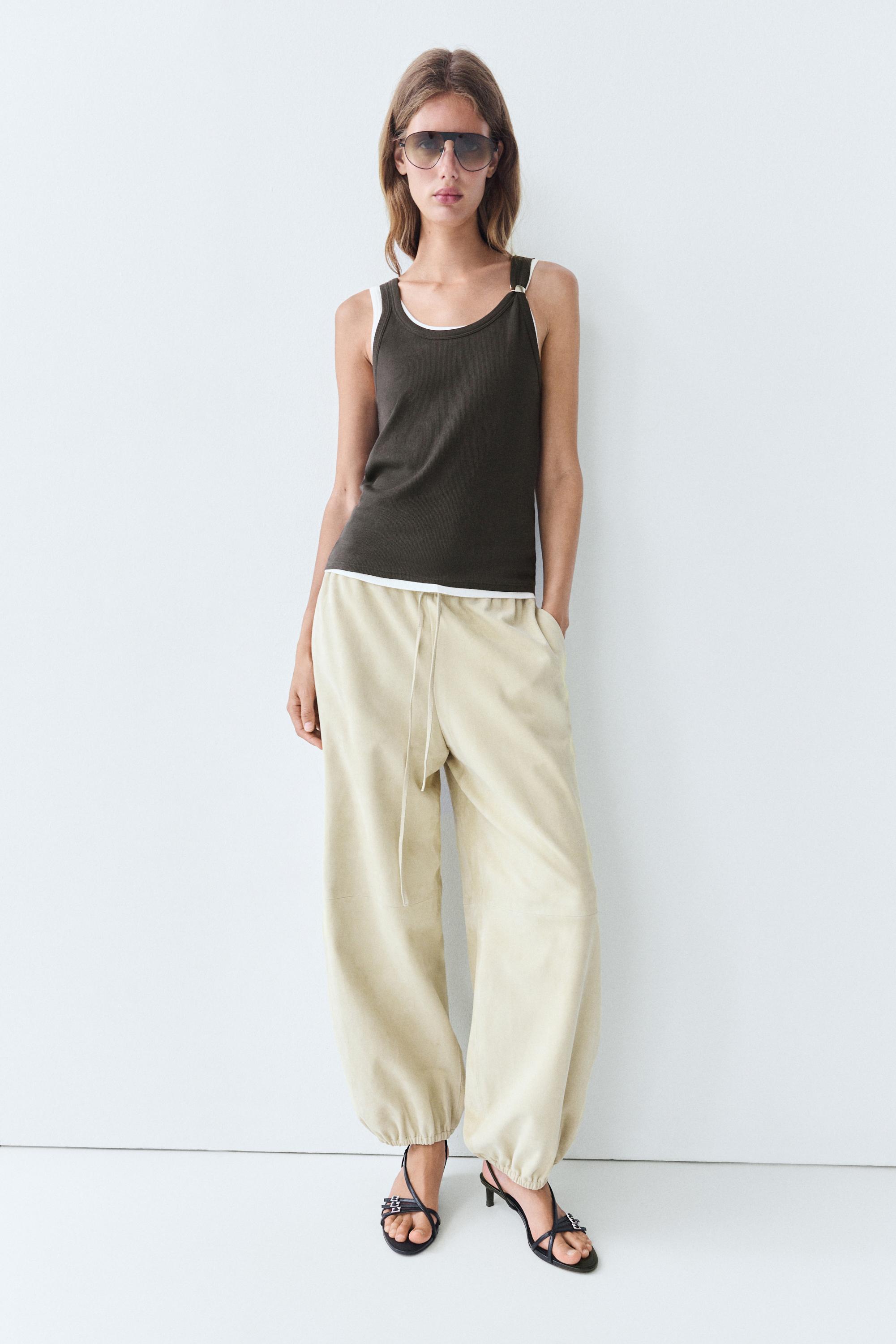 Double-layer strappy top with jewel detail